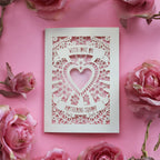 A cream cut out Mother's Day card that says "With love on Mothering Sunday"