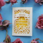 A papercut Mother's day card that says "Name, with love on Mothering Sunday"