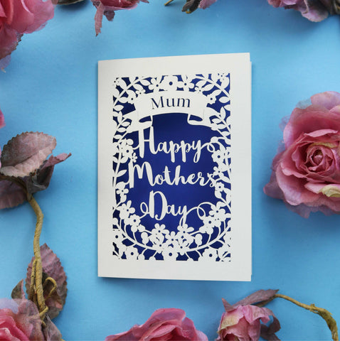 A personalised laser cut card for mother's day. A name is cut from a banner above the wordsA personalised laser cut card for mother's day. A name is cut from a banner above the words "Happy Mother's Day"  - A5 / Infra Violet