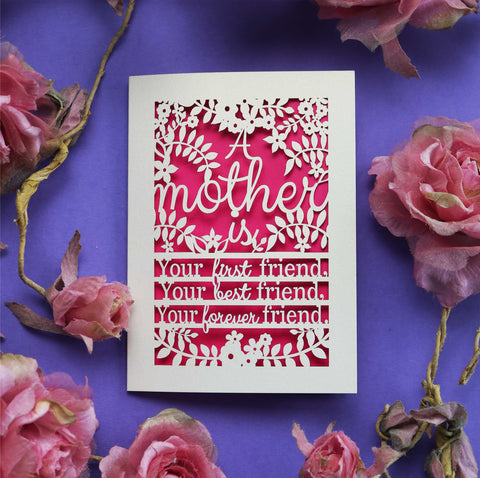 A laser cut mother's day card that says "A mother is your first friend, your best friend, your forever friend."