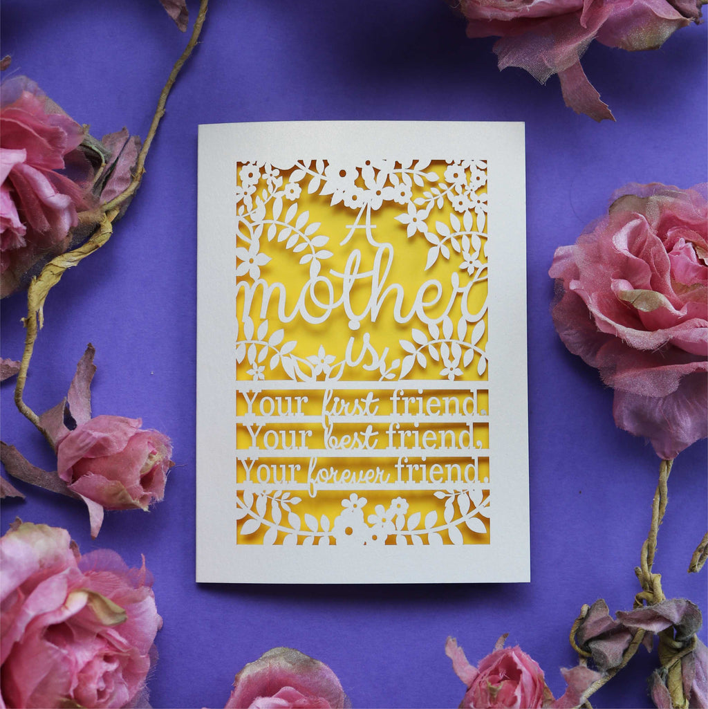 A laser cut mummy card that says "A mother is your first friend, your best friend, your forever friend."