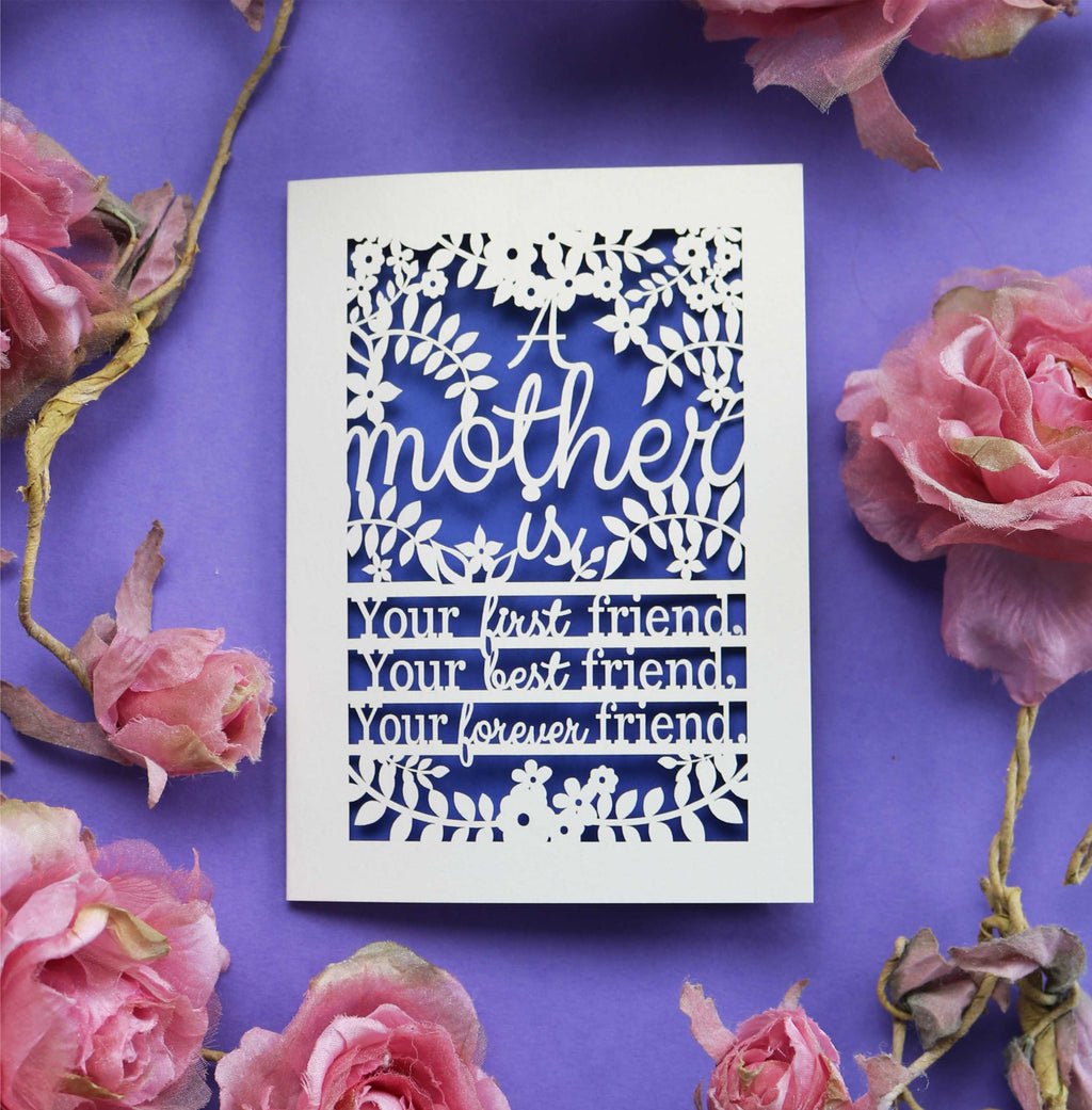 A laser cut mother's day card that says "A mother is your first friend, your best friend, your forever friend."