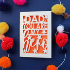 A cream and orange cut out card with "dad, you are my hero"