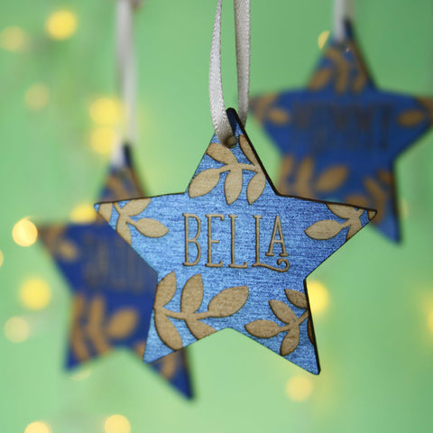 A blue star personalised Christmas decoration