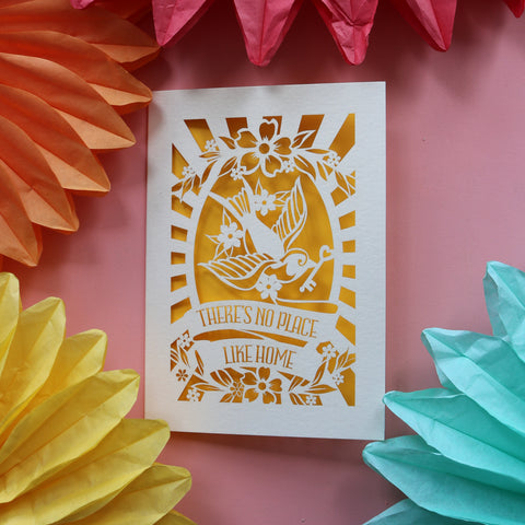 A unusual new home card featuring a bird holding a key and the words "There's no place like home." - A6 (small) / Sunshine Yellow