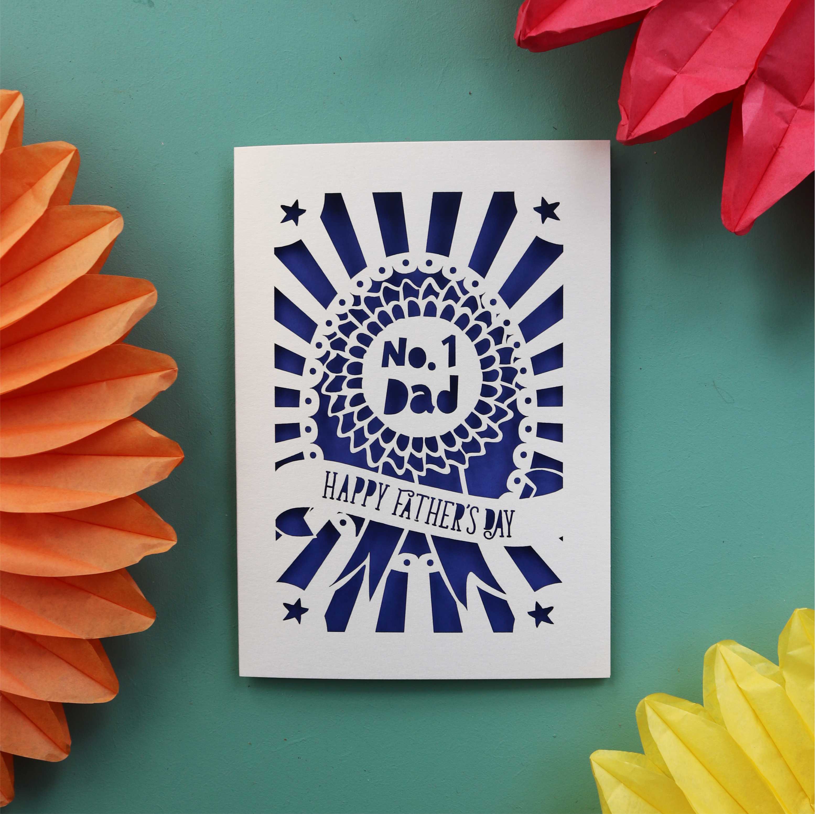 A unique laser cut Father's Day card featuring a rosette that says "No. 1 Dad" and "Happy Father's Day