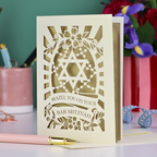 Bar Mitzvah card with decorative design and text on a colorful background