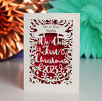 Personalized Our First Christmas card with decorative elements 