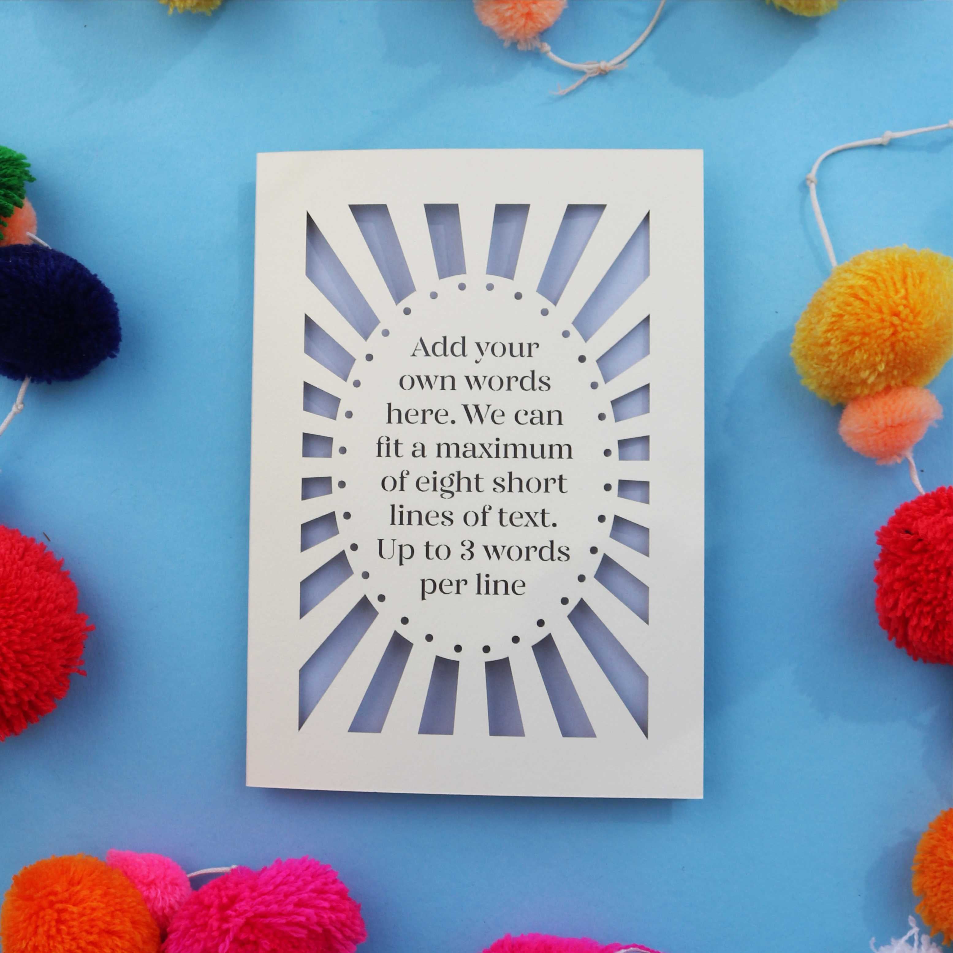 A personalised cut out card with your own text surrounded by a laser cut border.