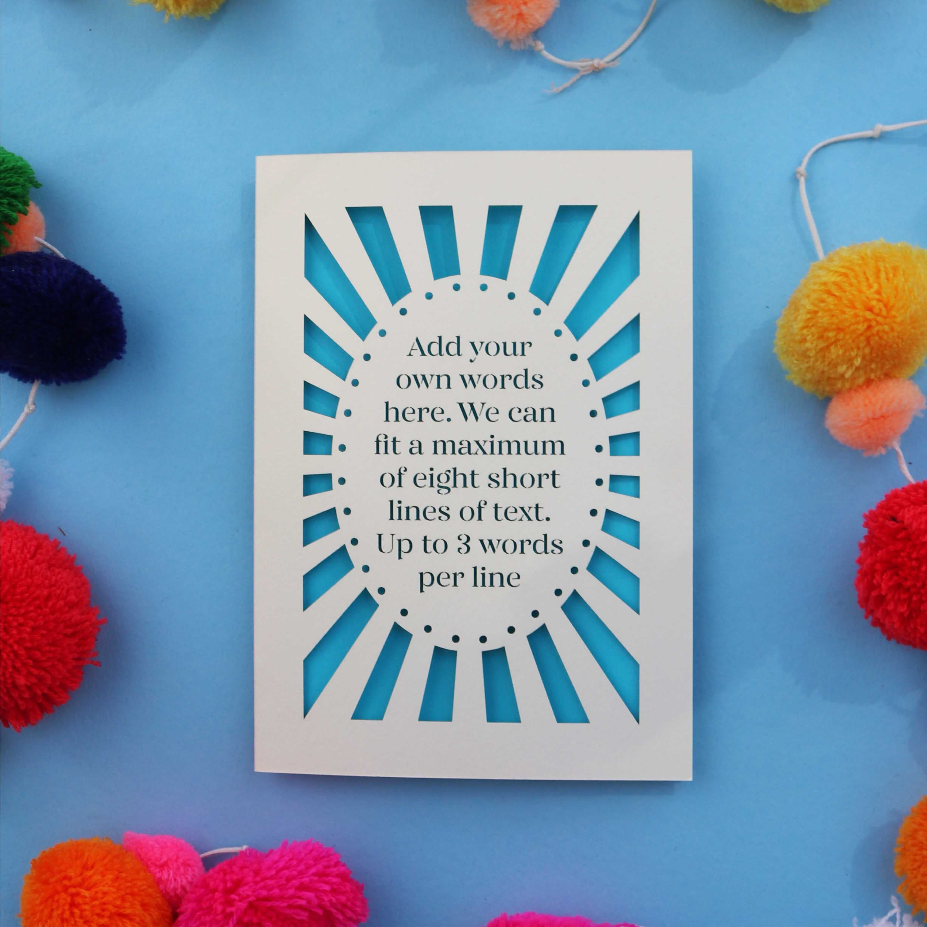 A laser cut greetings card featuring text on up to eight lines
