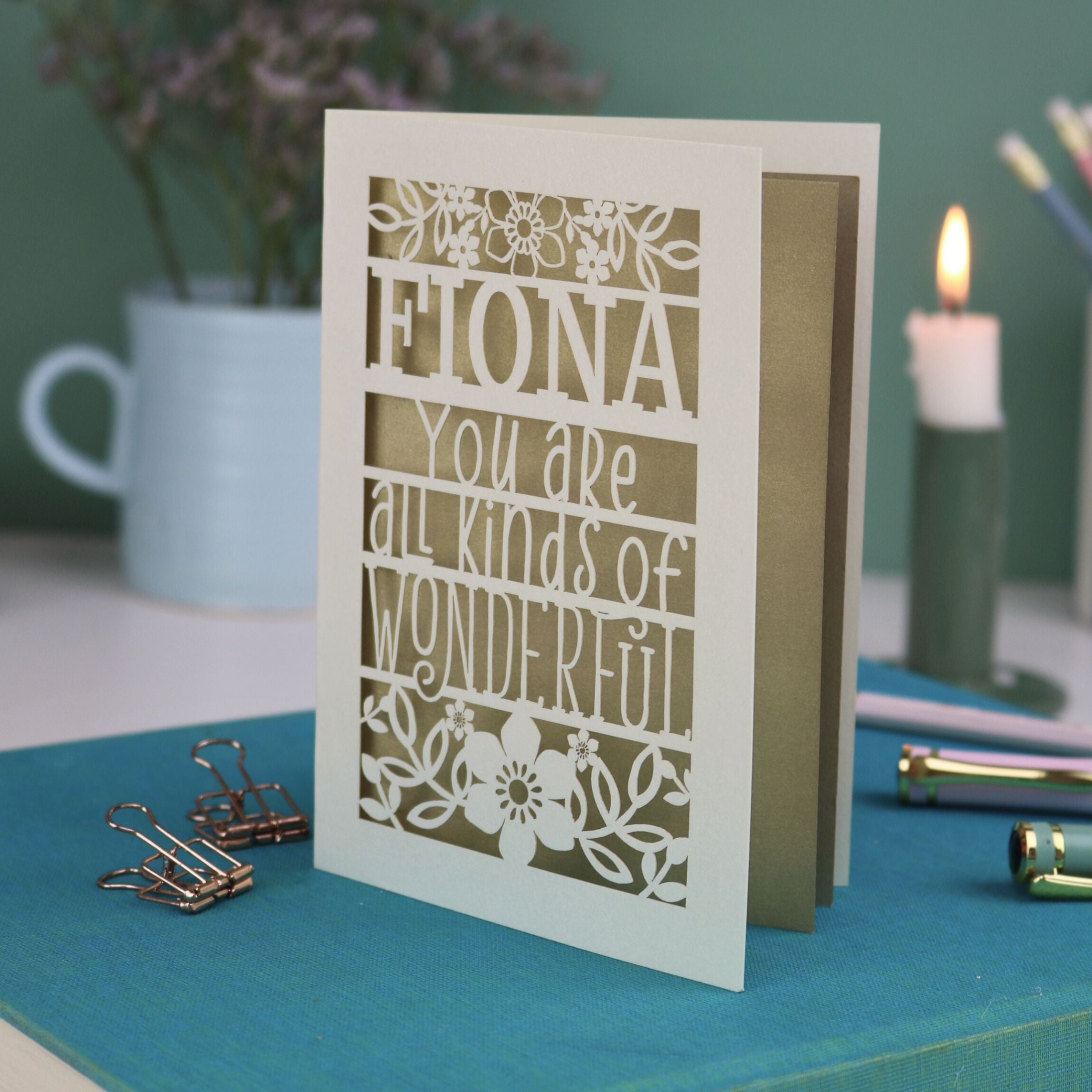A laser cut greetings card personalised with the name Fiona, and with the text "You are all kinds of wonderful"
