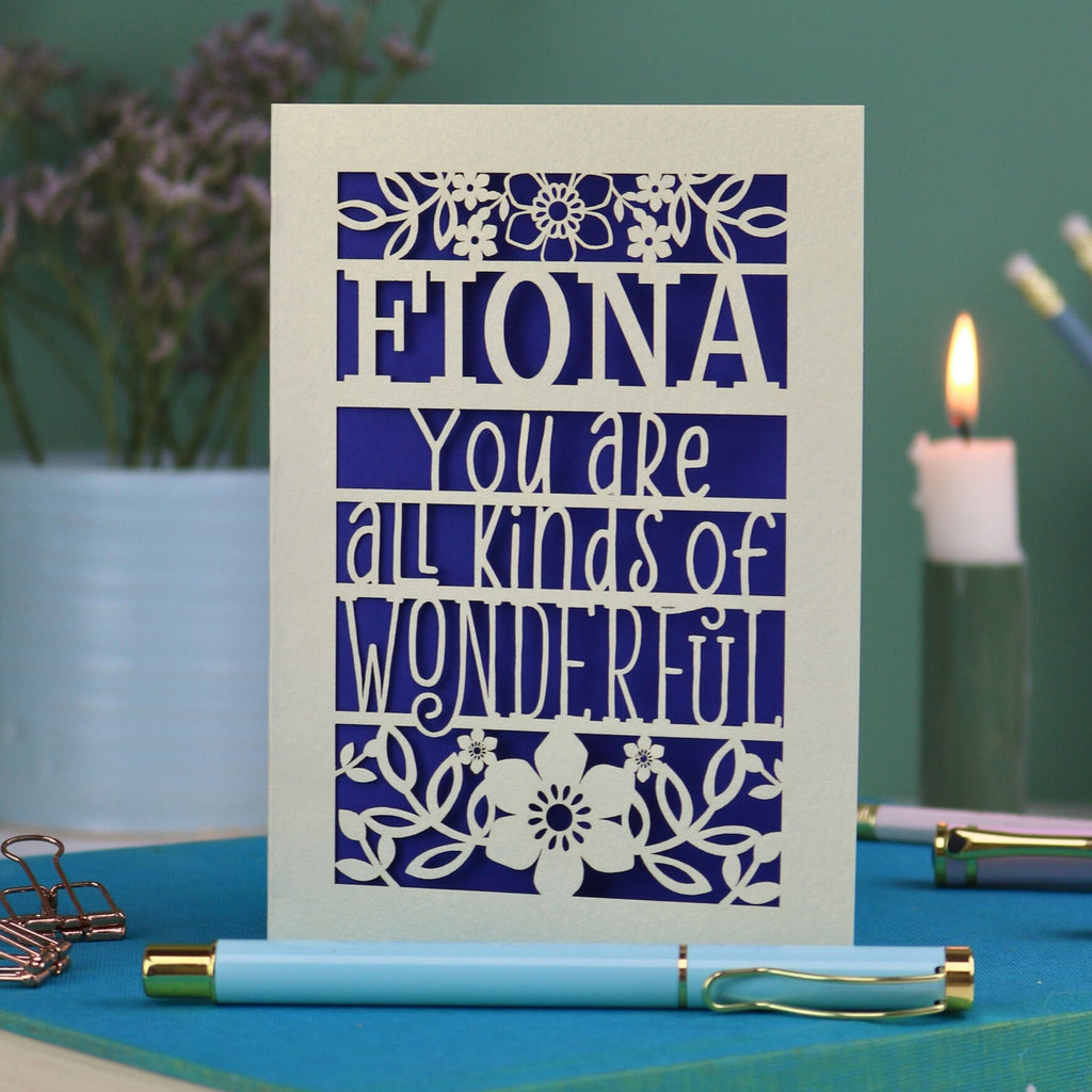 A laser cut greetings card personalised with the name Fiona, and with the text "You are all kinds of wonderful"