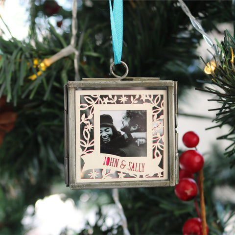 A personalised paper cut with a photograph in a recycled floating frame Christmas decoration - 