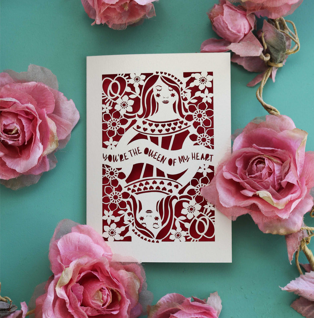 A laser cut Valentine's card inspired by the Queen of hearts.