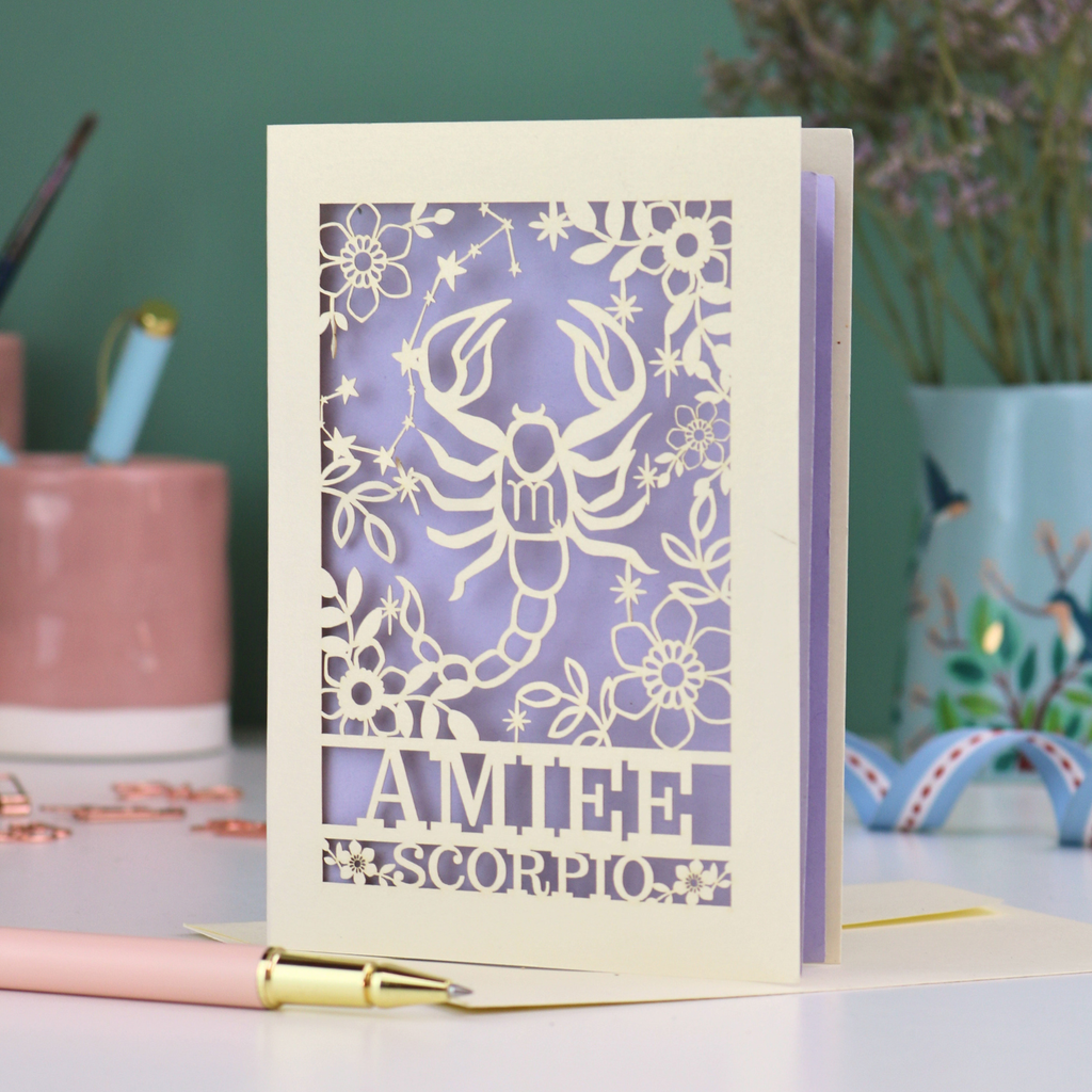 Scorpio birthday card with laser cut scorpion and constellation design, personalised with the name "Amiee" and text 'Scorpio' underneath