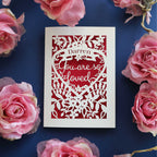 Paper cut Valentines cards that say "Name, you are so loved"