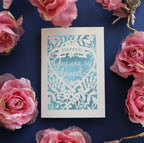 Laser cut Valentines cards that read "Name, you are so loved"