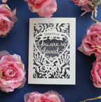 A personalised laser cut Valentines card that says "Name, you are so loved"
