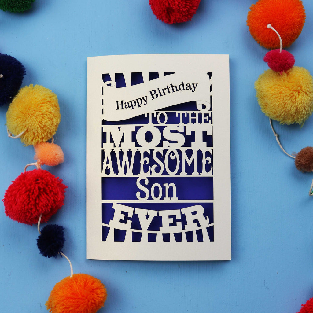 Son Birthday Card with 'Happy Birthday to the most awesome son ever' text on a blue background with colourful pom-poms.