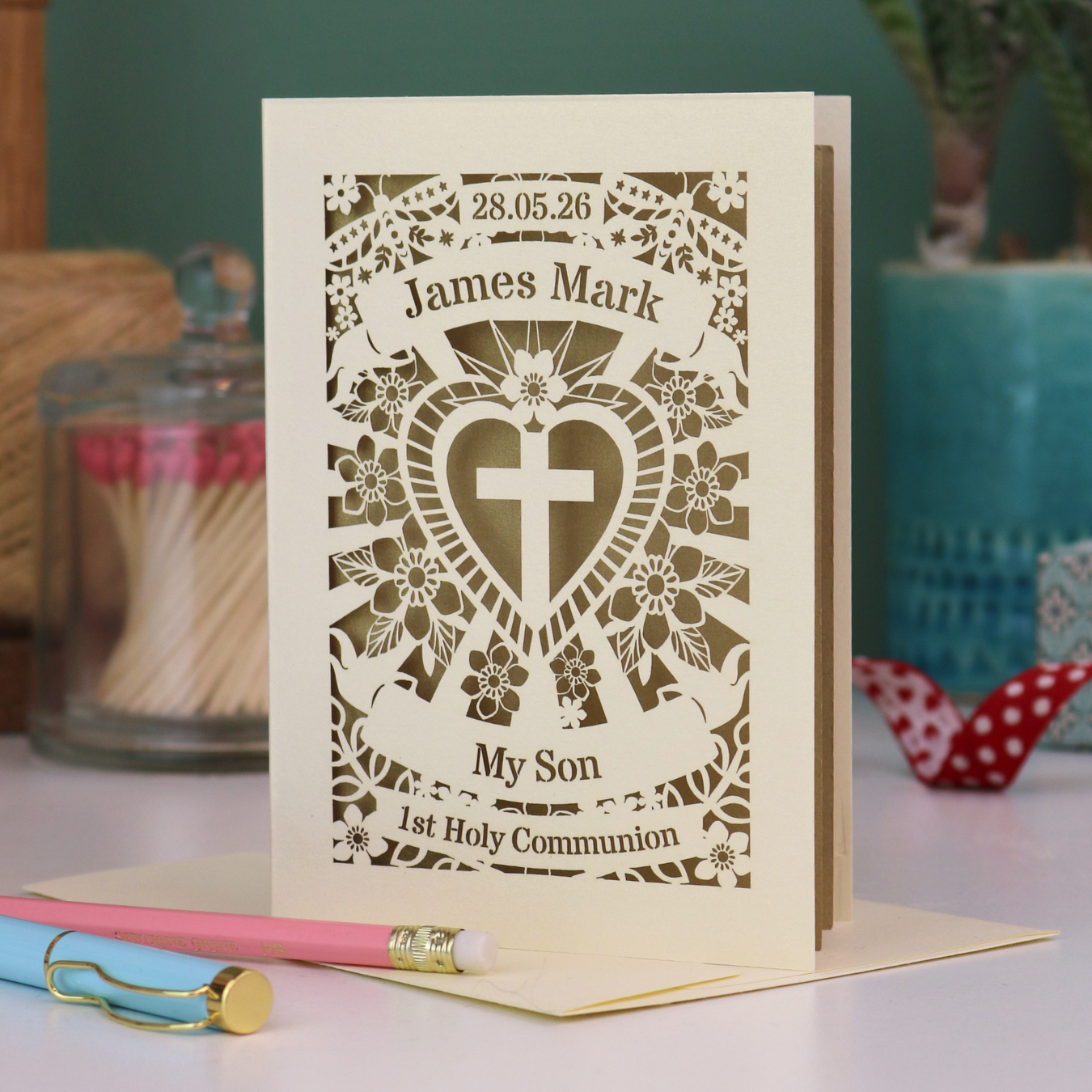 A laser cut son 1st Holy communion card, personalised with the date and name, and with the text "My Son" "1st Holy Communion"