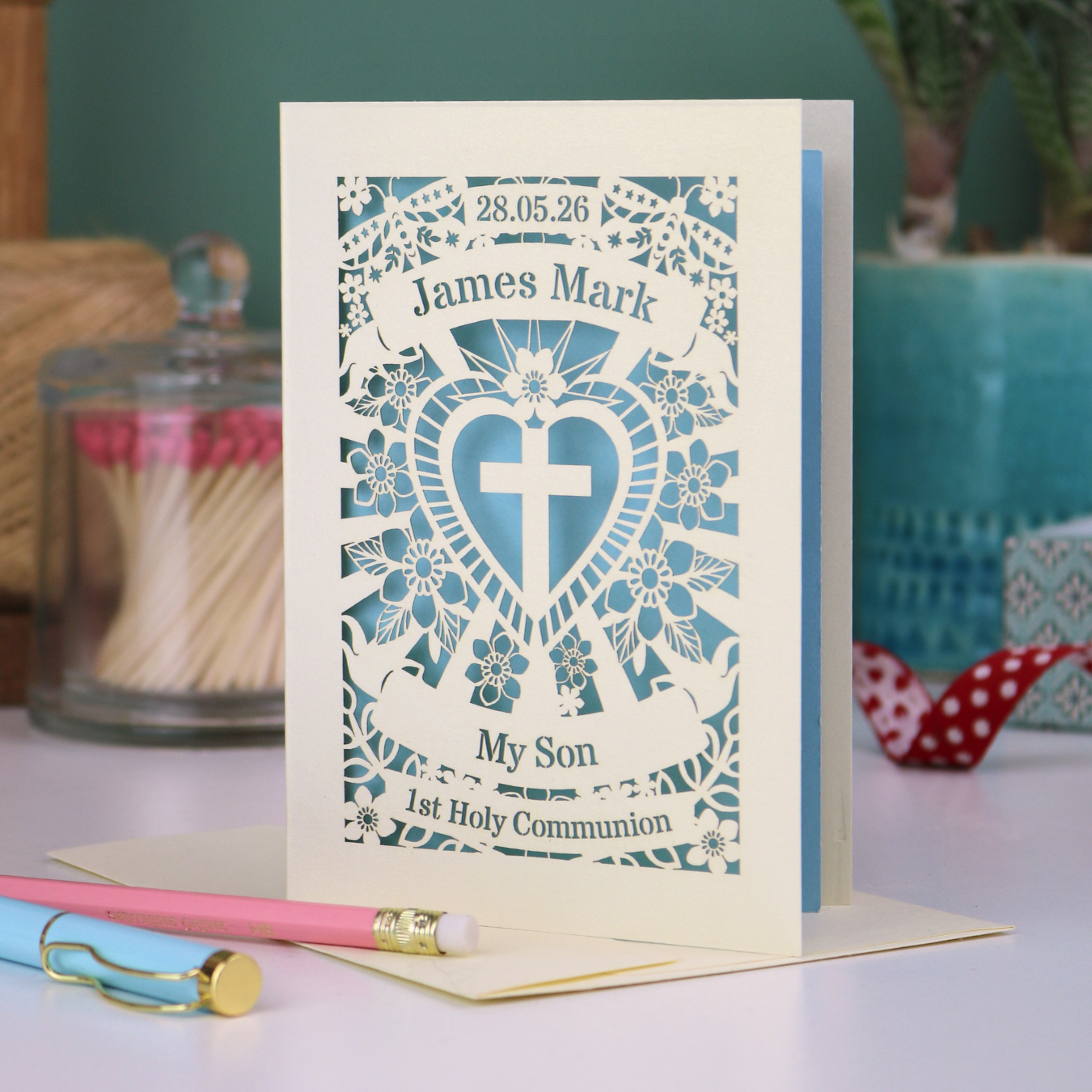 A laser cut son 1st Holy communion card, personalised with the date and name, and with the text "My Son" "1st Holy Communion"