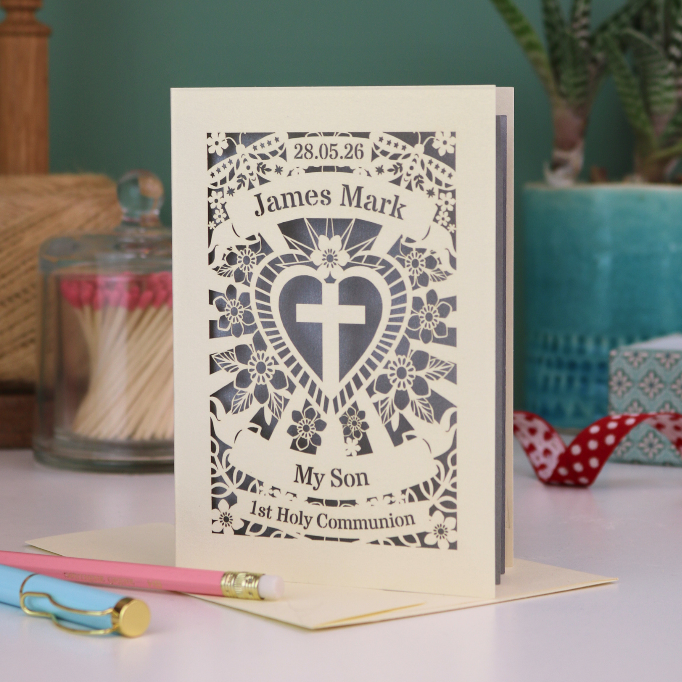 A laser cut son 1st Holy communion card, personalised with the date and name, and with the text "My Son" "1st Holy Communion"