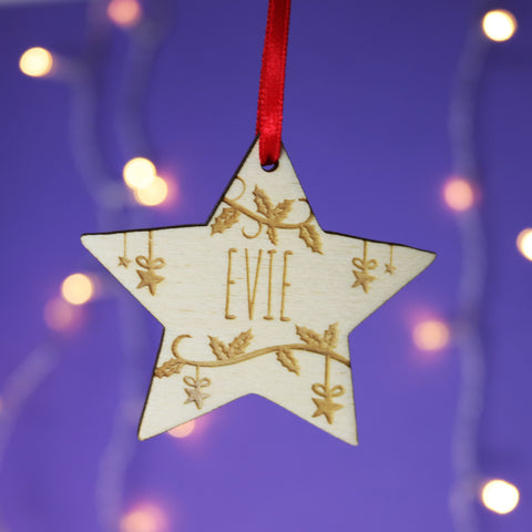 Personalised Christmas decorations- star shaped and with a name engraved - 