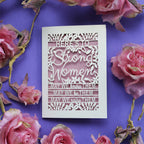 A laser cut Mothers Day Card that says "Here's to Strong Women, may we know them, may we be them, may we raise them"
