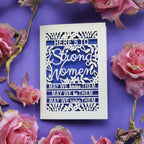 A laser cut card for mum that says "Here's to Strong Women, may we know them, may we be them, may we raise them"