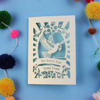 Laser Cut Sympathy Card with 'So Sorry For Your Loss' text and dove design on a blue background.