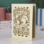 A laser cut cream thank you teacher card with globe design and the text Best Teacher in the World Mr James"