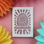 A unique laser cut thank you teacher card for a teaching assistant. Card has a rosette with "Best teaching assistant ever" and is personalised with their name