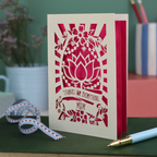 Thank you Mum Card with floral design and text on a desk with stationery items