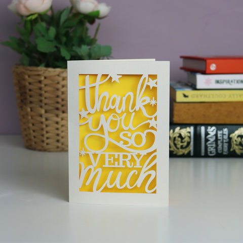 A papercut thank you card that says "Thank you so very much". Cream card with a yellow insert paper. - A5 (large) / Sunshine Yellow