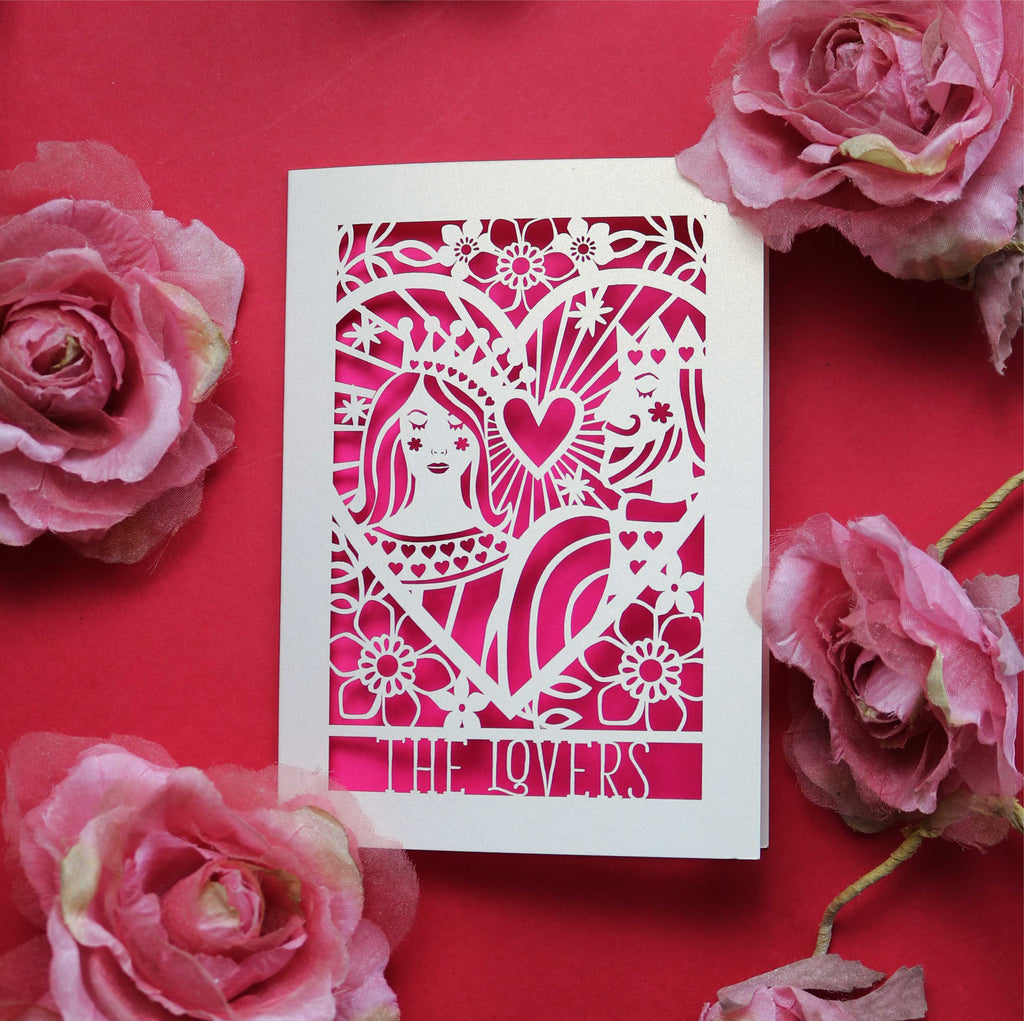 A wedding card featuring an illustration inspired by the lovers tarot card