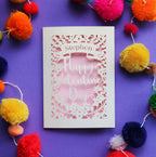 A laser cut Valentine's card, personalised with a name