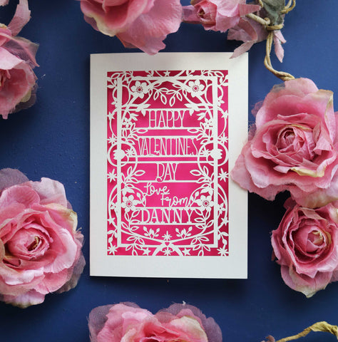 A personalised Valentines card, laser cut with a floral and star border and the words "Happy Valentine's Day, Love from NAME" - A6 (small) / Shocking Pink
