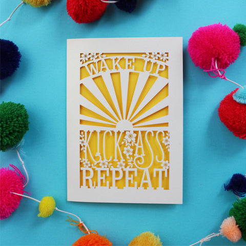 A laser cut good luck card that says "Wake up, Kick ass, repeat" - A6 (small) / Sunshine Yellow