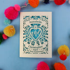 Personalised anniversary card with decorative elements on a blue background