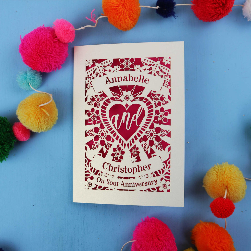 Personalised laser cut anniversary card with decorative elements on a blue background