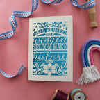 A cut out card for rebel girls. Card says "Well behaved women seldom make history"