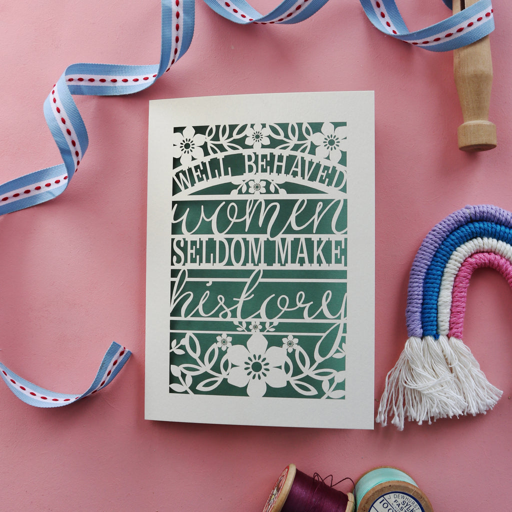 A laser cut greetings card with a motivational quote for women,  "Well behaved women seldom make history"