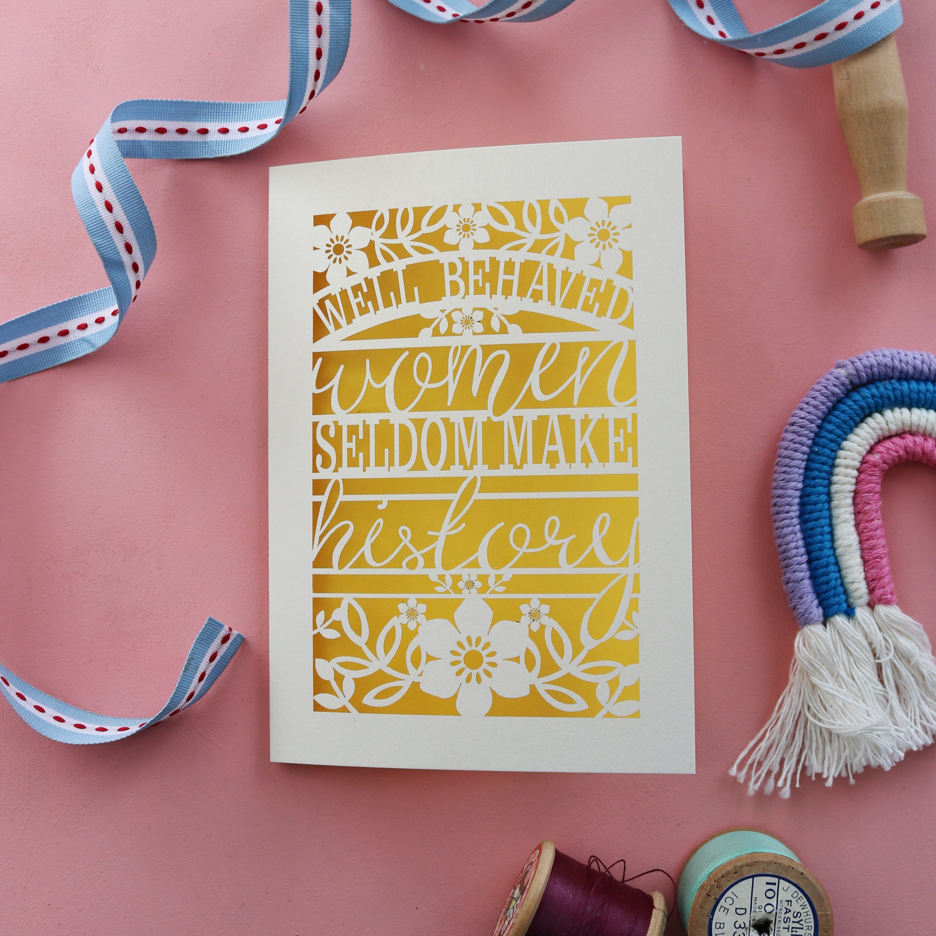 A paper cut card for girls, with an inspiring quote for women, "Well behaved women seldom make history"