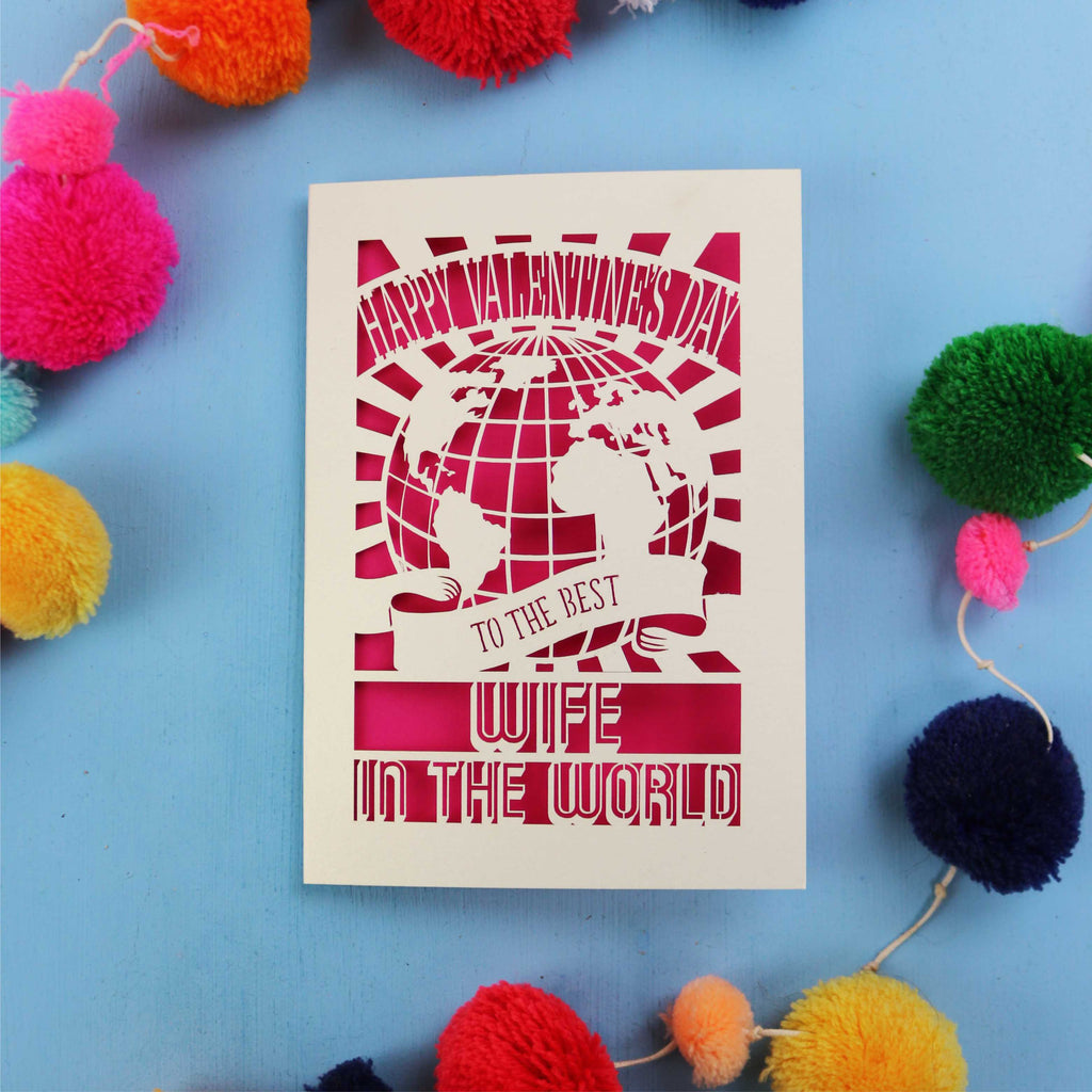 A Wife Valentine's Day card for the best wife in the world with colourful pom-poms on a blue background