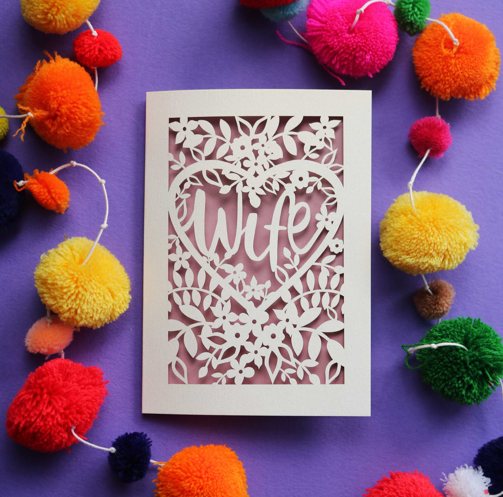 A Laser cut Valentine's card that says "Wife" 