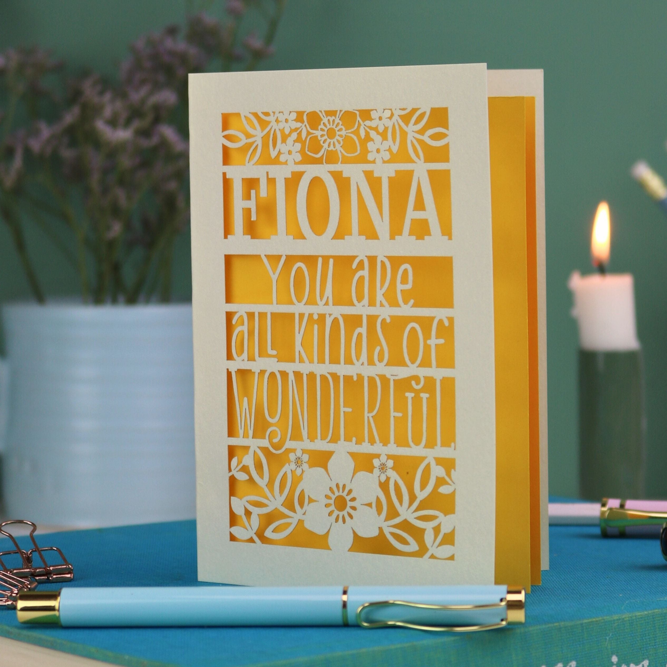 A laser cut greetings card personalised with the name Fiona, and with the text "You are all kinds of wonderful"