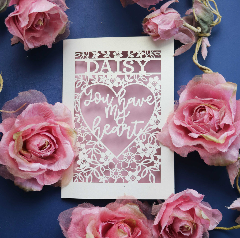 A personalised paper cut Valentine's card that says "You have my heart"