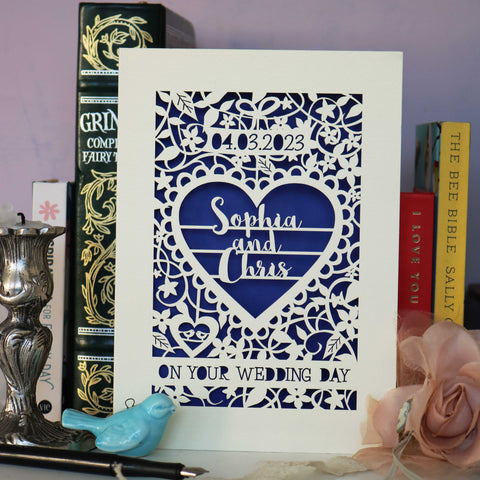 A laser cut wedding card for your favourite people. Personalised with names and date, it's a card to keep and frame.  - A6 (small) / Infra Violet