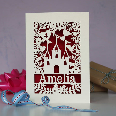 Princess castle paper cut birthday card, personalised with a name and age. Cut out card reveals a dark red paper insert. - A5 / Dark Red