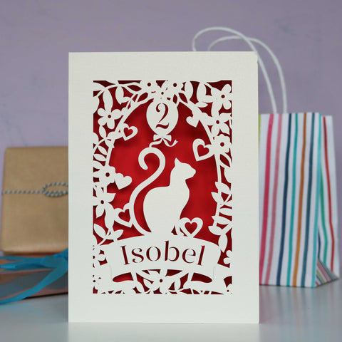 Striking cat design papercut birthday card.  Great for the cat people in your life! Personalised with a name and age and cut from cream card with a bright red background. - A6 (small); / Bright Red